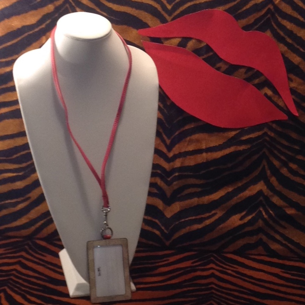 Coach I.D. Holder nwot pink and beige in color